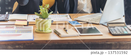 Banner Office laptop business financial document chart and graph on office wooden table coffee cup. Panorama Flat lay notebook computer laptop on office desk. Business stuff mockup with copy space Banner Office laptop business financial document chart and graph on office wooden table coffee cup. Panorama Flat lay notebook computer laptop on office desk. Business stuff mockup with copy space 137531592