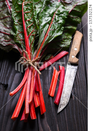 Swiss chard with red stalks and green leaves 137532174