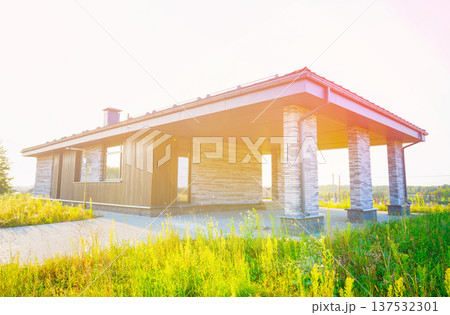 Design of modern suburb home with carport. One-story house with garage. New Home. Design of modern suburb home with carport. One-story house with garage. New Home. 137532301