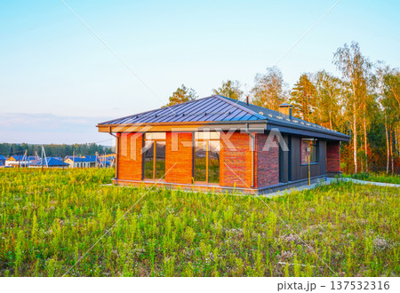 Modern suburban Home. New Home Modern House Facade. Suburb building development. Modern suburban Home. New Home Modern House Facade. Suburb building development. 137532316