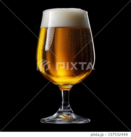 Foamy amber ale beer in a tall tulip glass with creamy foam head, isolated on black background, concept of refreshment and taste 137532449