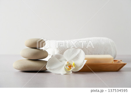 spa composition with white stones and flower 137534595