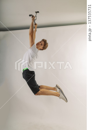 Handsome young guy in stylish clothes on white 137535731