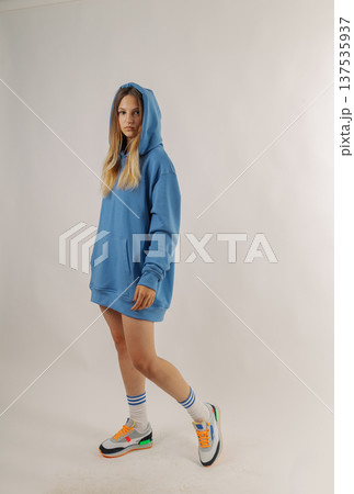 Beautiful young girl in fashionable clothes on Beautiful young girl in fashionable clothes on 137535937