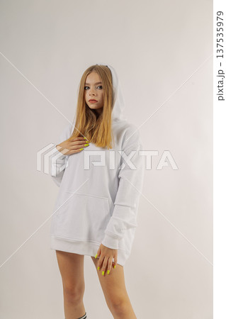 Beautiful young girl in fashionable clothes on Beautiful young girl in fashionable clothes on 137535979