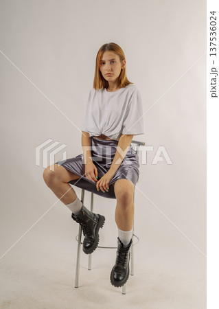 Beautiful young girl in fashionable clothes on Beautiful young girl in fashionable clothes on 137536024