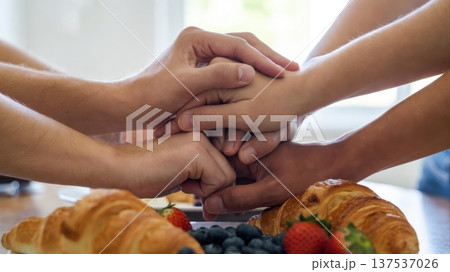 Hands Joined Over Breakfast Table With Croissants 137537026