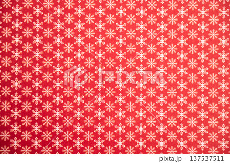 Red festive background with white snowflake pattern for holiday decor 137537511