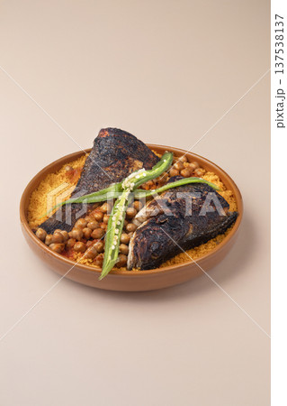 traditional Tunisian couscous with fish traditional Tunisian couscous with fish 137538137