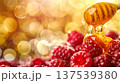 Golden honey dripping onto fresh raspberries, natural sweetness and healthy food macro concept 137539380