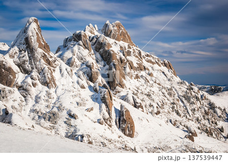 Carpathian Mountains, Romania. Snow-covered rocky peaks in Ciucas Massif. 137539447