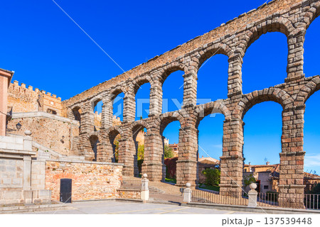 Segovia, Spain. Ancient Roman aqueduct on Plaza del Azoguejo square 137539448
