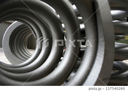 large steel springs inside the factory large steel springs inside the factory 137540260