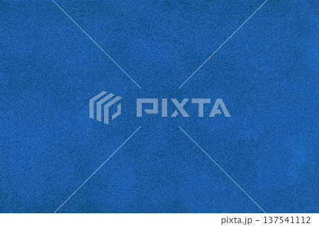 Dark blue suede fabric background with matte nap velvet texture. Royal blue tones and soft felt textile surface in macro Dark blue suede fabric background with matte nap velvet texture. Royal blue tones and soft felt textile surface in macro 137541112