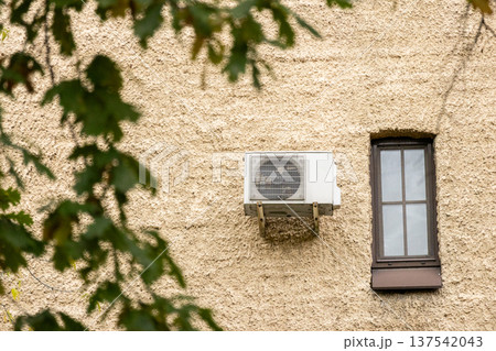 air conditioning on facade of building, air cooling in hot weather.  137542043