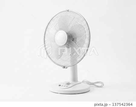 Small White Electric Desktop Appliance Circulating Air for Personal Cooling on a Clean Light Background 137542364