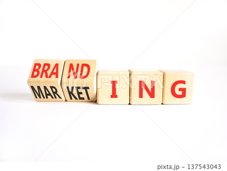 Branding and marketing symbol. Concept words Marketing to Branding on beautiful wooden cubes. Beautiful white table white background. Business branding and marketing concept. Copy space. Branding and marketing symbol. Concept words Marketing to Branding on beautiful wooden cubes. Beautiful white table white background. Business branding and marketing concept. Copy space. 137543043