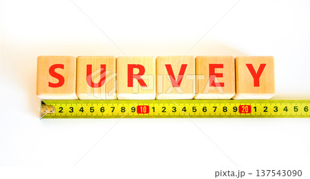 Survey word symbol. Concept word Survey on beautiful wooden blocks. Beautiful white background. Beautiful yellow tape measure ruler. Business psychological medical survey word concept. Copy space. Survey word symbol. Concept word Survey on beautiful wooden blocks. Beautiful white background. Beautiful yellow tape measure ruler. Business psychological medical survey word concept. Copy space. 137543090