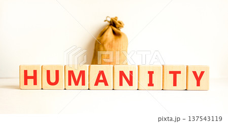 Humanity word symbol. Concept word Humanity on beautiful wooden blocks. Beautiful white background. Beautiful canvas bag. Business support help humanity word concept. Copy space. Humanity word symbol. Concept word Humanity on beautiful wooden blocks. Beautiful white background. Beautiful canvas bag. Business support help humanity word concept. Copy space. 137543119
