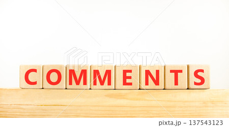 Comments comment word symbol. Concept word Comments on beautiful wooden blocks on wooden beam. Beautiful white background. Business support help comments comment word concept. Copy space. Comments comment word symbol. Concept word Comments on beautiful wooden blocks on wooden beam. Beautiful white background. Business support help comments comment word concept. Copy space. 137543123