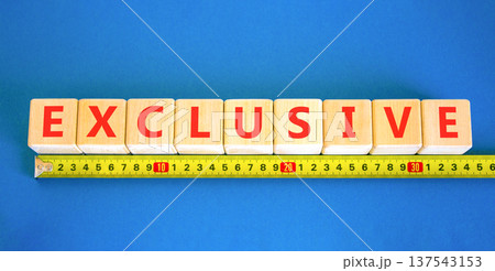 Exclusive symbol. Concept words Exclusive on beautiful wooden blocks. Beautiful blue background. Beautiful yellow ruler. Business support exclusive concept. Copy space. Exclusive symbol. Concept words Exclusive on beautiful wooden blocks. Beautiful blue background. Beautiful yellow ruler. Business support exclusive concept. Copy space. 137543153