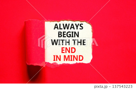 Begin with the end in mind symbol. Concept words Always begin with the end in mind on beautiful white paper. Beautiful red paper background. Business begin with the end in mind concept. Copy space. 137543223