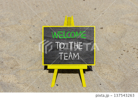 Support, help welcome to the team symbol. Concept words Welcome to the team on beautiful blackboard. Beautiful sand beach background. Business welcome to the team concept. Copy space. Support, help welcome to the team symbol. Concept words Welcome to the team on beautiful blackboard. Beautiful sand beach background. Business welcome to the team concept. Copy space. 137543263
