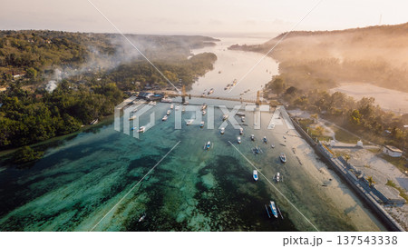 Drone view of a bridge between two islands over a narrow ocean channel. Nusa Lembongan and Nusa Ceningan bridge. 137543338