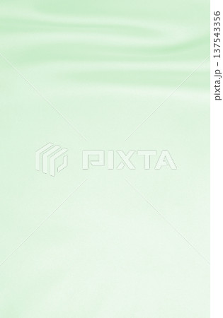 Smooth elegant green silk or satin luxury cloth texture as abstract background. Luxurious background design 137543356