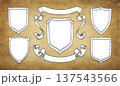 Hand-drawn heraldic shields with vintage ribbons 137543566