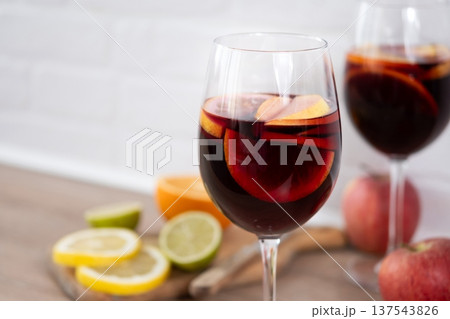 Sangria cocktail with fresh fruit 137543826