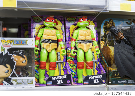 Raphael action figures from Teenage Mutant Ninja Turtles on a store shelf. Raphael action figures from Teenage Mutant Ninja Turtles on a store shelf. 137544433
