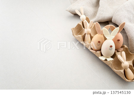 Zero waste Easter. Easter bunny eggs in egg carton for spring holiday 137545130