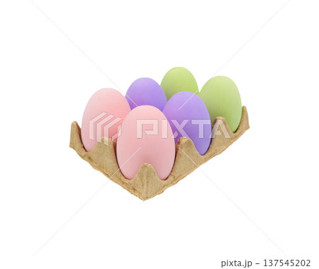 Six pastel-colored eggs in a cardboard egg carton arranged neatly on a white background, showcasing a variety of soft hues for seasonal decoration Six pastel-colored eggs in a cardboard egg carton arranged neatly on a white background, showcasing a variety of soft hues for seasonal decoration 137545202