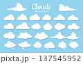 A set of white clouds of different shapes on a blue background. A set of cartoon clouds and cartoon-style speech bubbles. 137545952