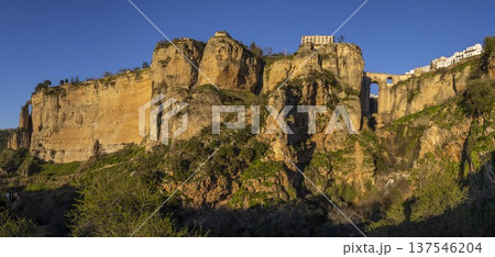 Exploring the natural beauty and historic architecture of Ronda, Spain, during a clear day 137546204