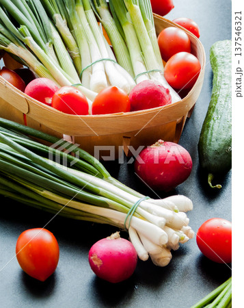 Seasonal diet, organic farming and growing fresh veggies. Fresh ripe vegetables in basket on table. 137546321