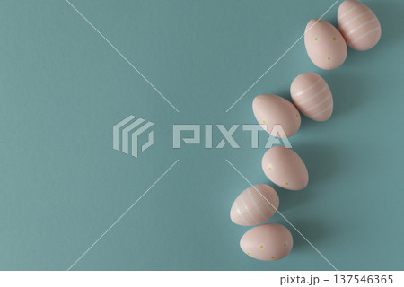 Pastel Pink Easter Eggs on Blue Background. Minimal Festive Composition Pastel Pink Easter Eggs on Blue Background. Minimal Festive Composition 137546365