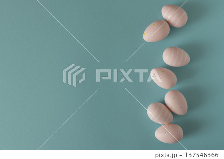 Pastel Pink Easter Eggs on Blue Background. Minimal Festive Composition 137546366