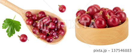 Red gooseberry in wooden bowl and spoon isolated on white background. Top view. Flat lay. 137546883