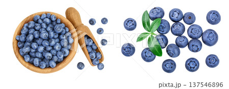 blueberry in wooden bowl isolated on white background. Top view. Flat lay. blueberry in wooden bowl isolated on white background. Top view. Flat lay. 137546896