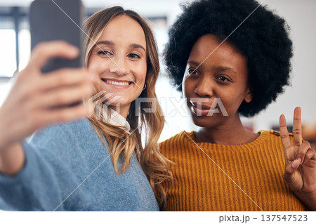 Social media, selfie and women in home with friends, diversity and relax with happiness in apartment or living room. Influencer, profile picture and people together with peace, smile and post on blog Social media, selfie and women in home with friends, diversity and relax with happiness in apartment or living room. Influencer, profile picture and people together with peace, smile and post on blog 137547523