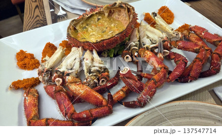 Gourmet presentation of spider crab dish with delicious seafood arrangement for culinary inspiration Gourmet presentation of spider crab dish with delicious seafood arrangement for culinary inspiration 137547714