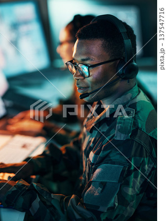 Military, call center and man on computer in office, data center and monitor for technical support, cybersecurity or surveillance. Army, officer and work in tech, security or government communication Military, call center and man on computer in office, data center and monitor for technical support, cybersecurity or surveillance. Army, officer and work in tech, security or government communication 137547716