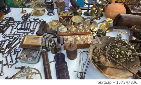 Vintage treasures at flea market featuring antiques and collectibles for unique decor and collectors. Flea market Rastro, Madrid, Spain Vintage treasures at flea market featuring antiques and collectibles for unique decor and collectors. Flea market Rastro, Madrid, Spain 137547836