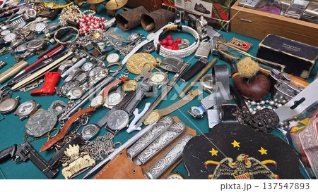 Vintage collection of antiques and collectibles at a flea market display. Rastro. Madrid. Spain 137547893