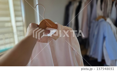 Selection of children's clothing in a closet for fashion and organization Selection of children's clothing in a closet for fashion and organization 137548031