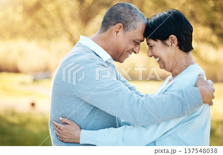 Mature couple, hug and love in garden for happy date, holiday and relax together in retirement. Man, woman and embrace with smile in park, nature and support of freedom, trust and loyalty to partner 137548038