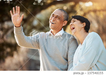 Happy, laugh and senior couple in a park on an outdoor date for romance, bonding or love. Smile, talking and elderly man and woman in retirement in conversation walking in a field together at sunset. Happy, laugh and senior couple in a park on an outdoor date for romance, bonding or love. Smile, talking and elderly man and woman in retirement in conversation walking in a field together at sunset. 137548155