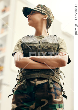 Army, thinking and arms crossed with a woman patriot in uniform for safety, surveillance or service. Military, idea and a serious young soldier looking confident or ready for battle in camouflage Army, thinking and arms crossed with a woman patriot in uniform for safety, surveillance or service. Military, idea and a serious young soldier looking confident or ready for battle in camouflage 137548617